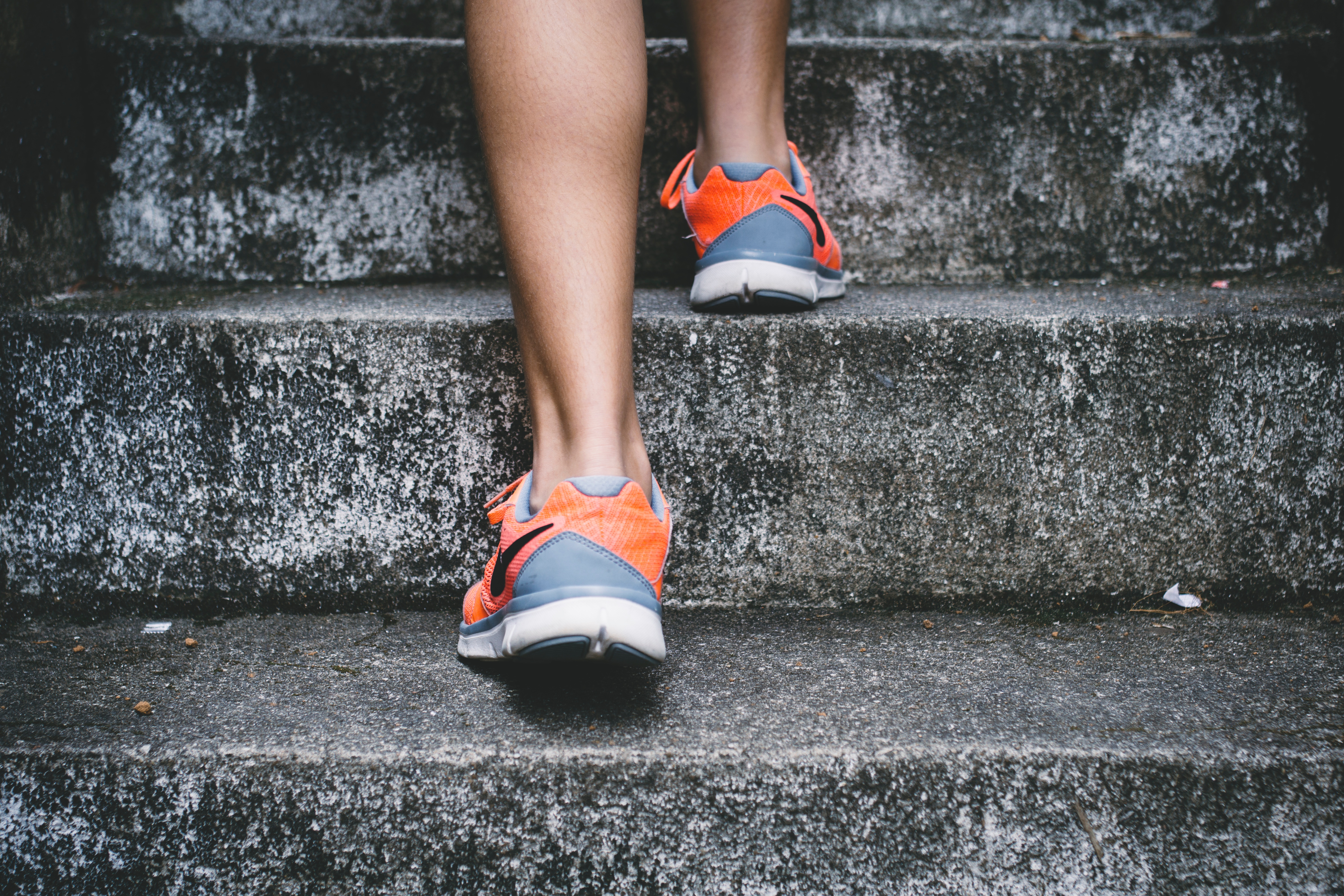 jogger running up stairs